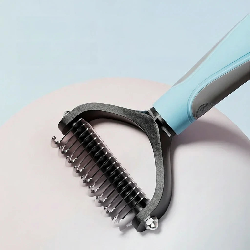 Brosse anti-mue double face pour chien et chat